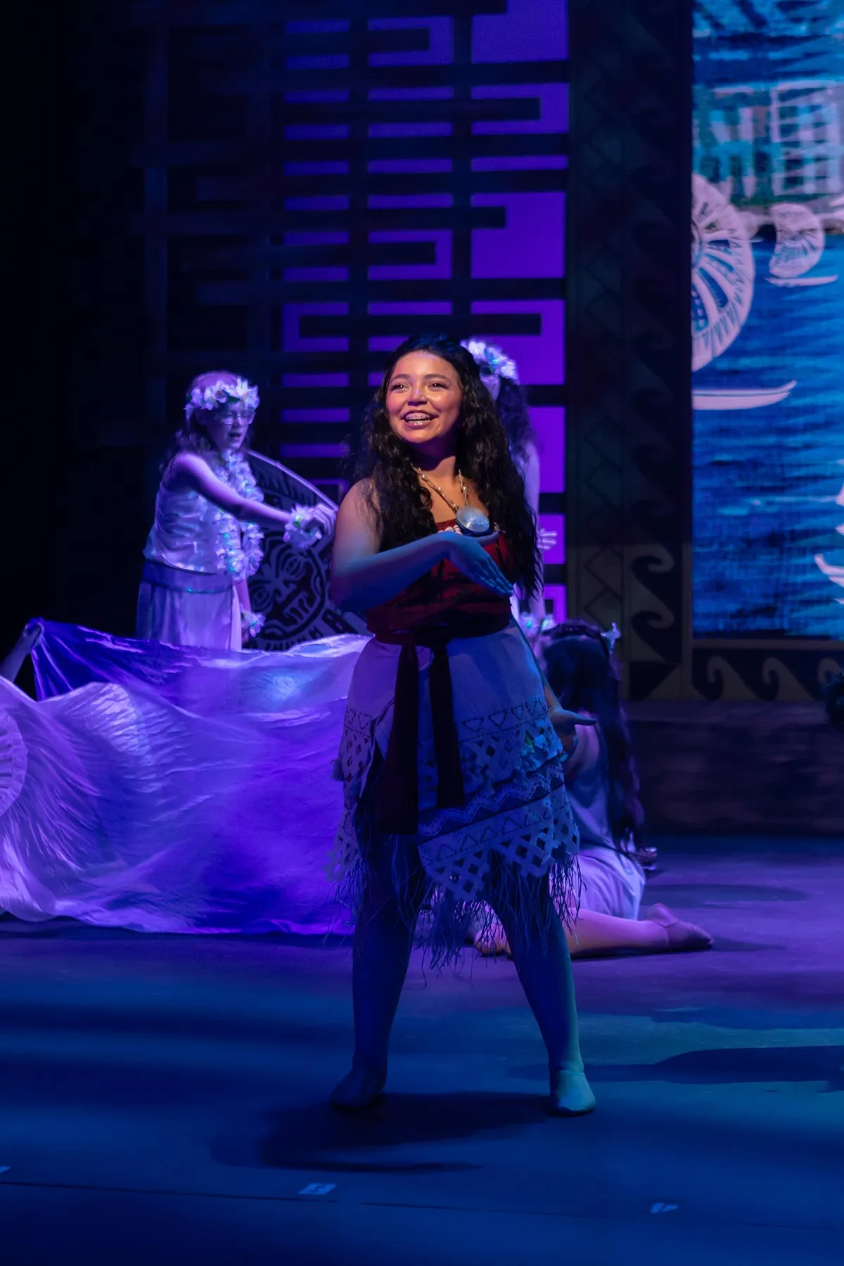 Jax performing as Moana on stage